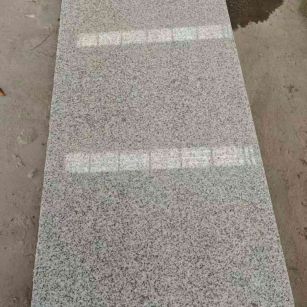 安庆芝麻白光面毛板